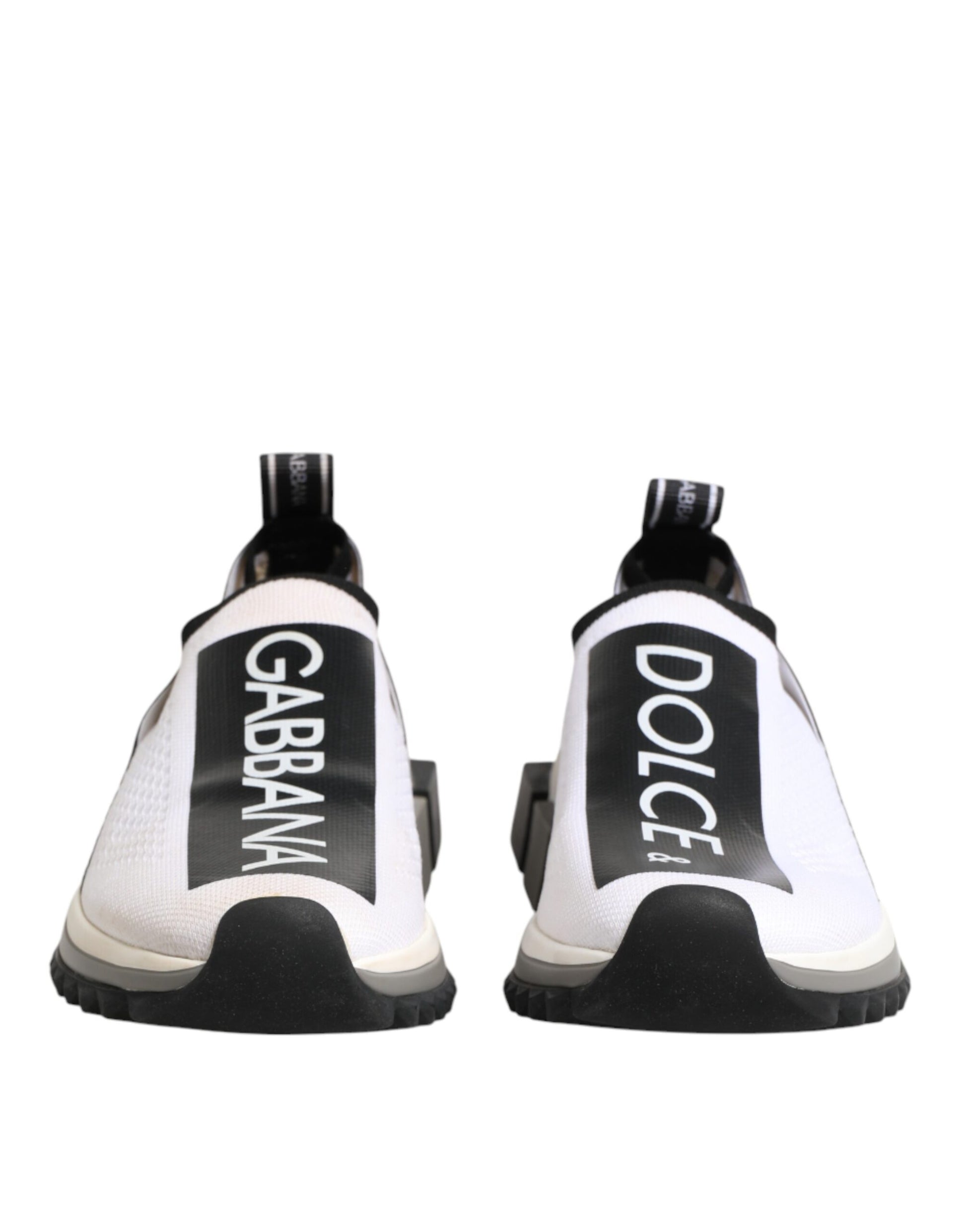 Pair of white sneakers with black checkered pattern on sides