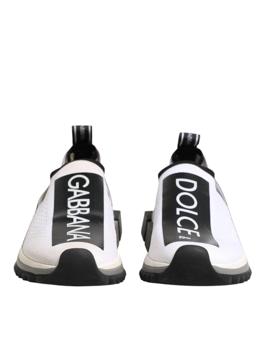 Pair of white sneakers with black checkered pattern on sides