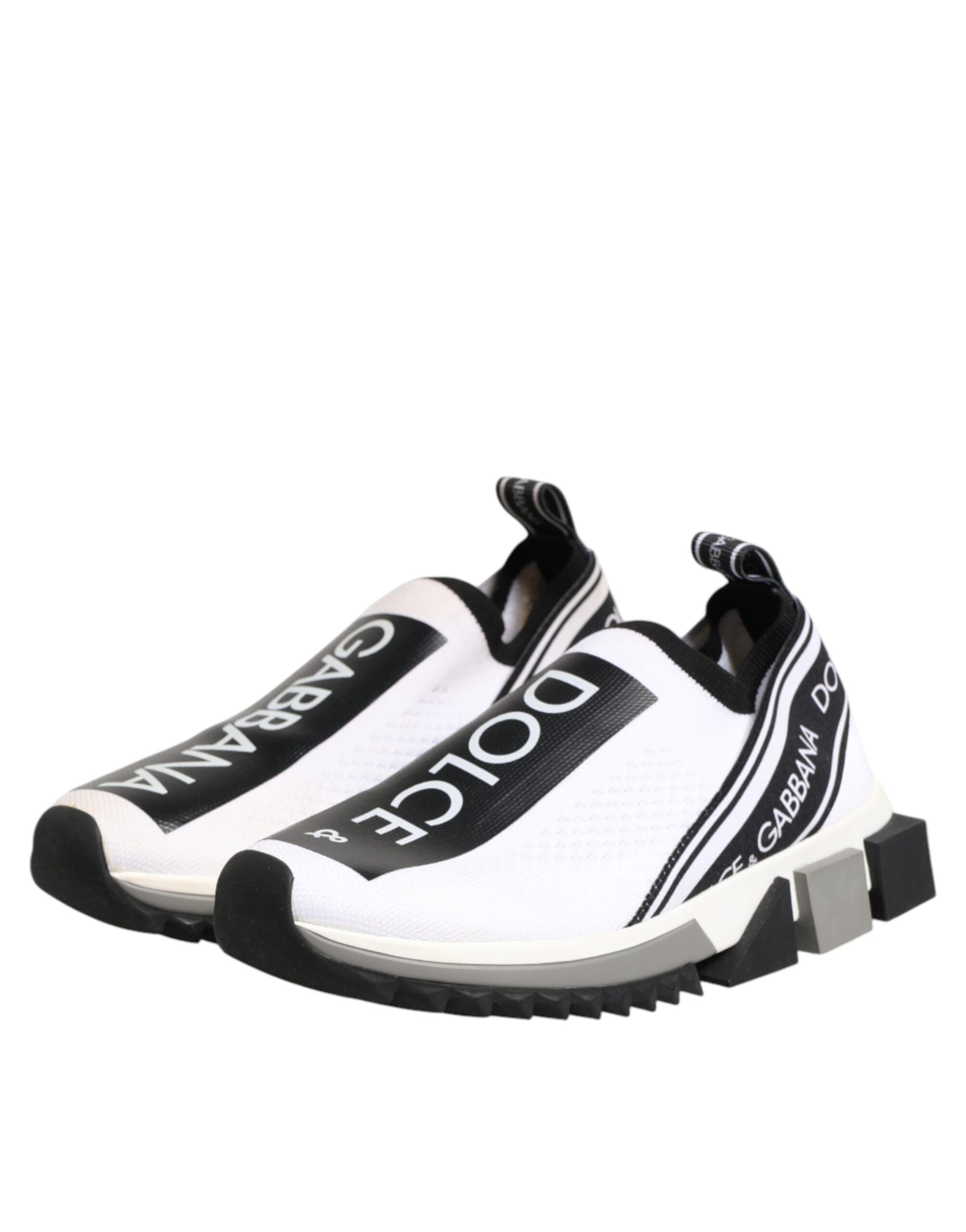 White sneakers with black stripes on sides