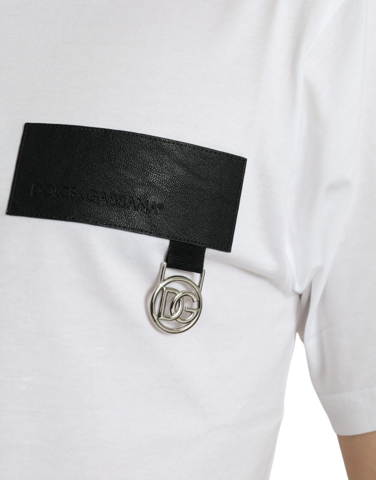 White t-shirt with black leather patch on sleeve