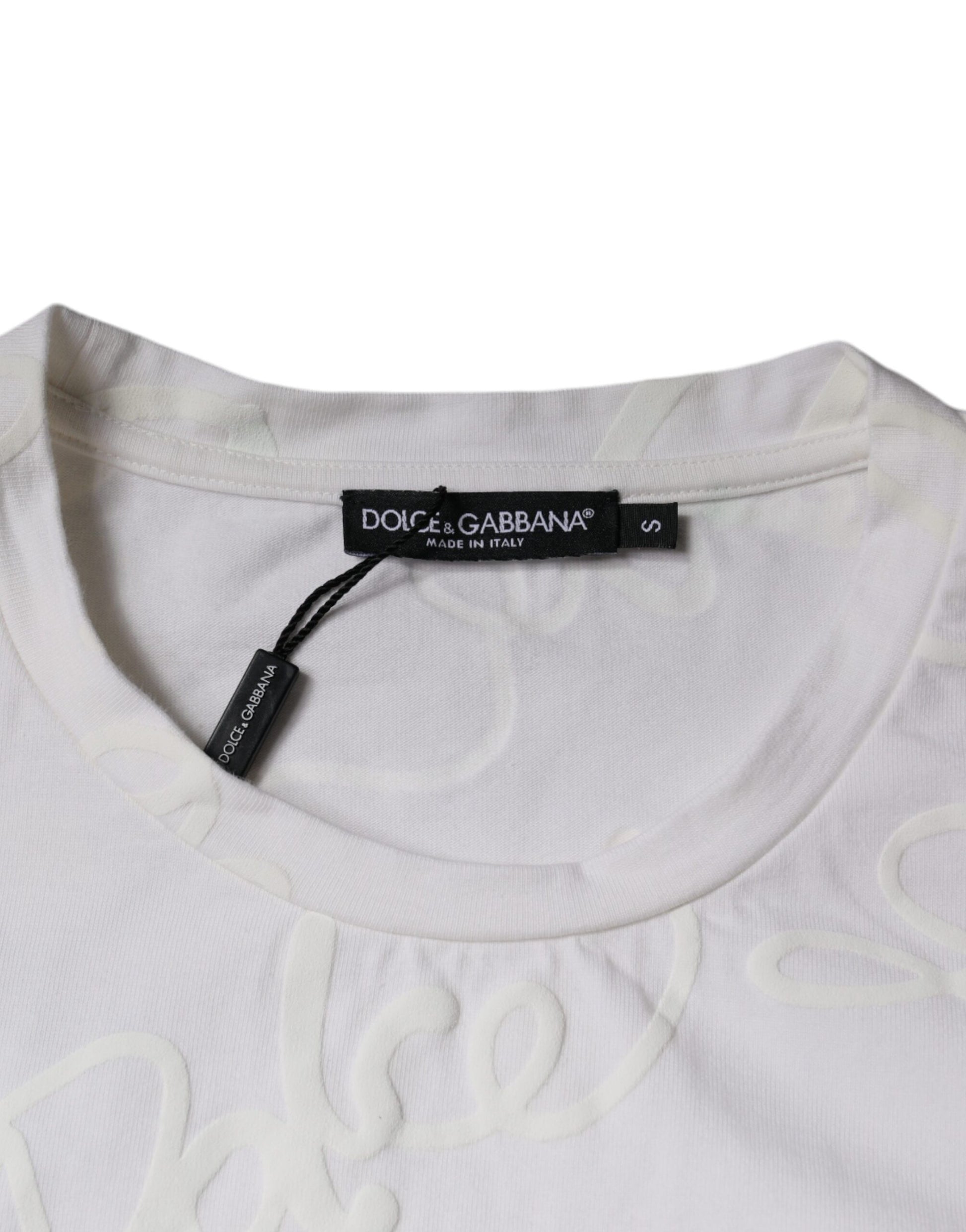 White shirt on hanger with black label
