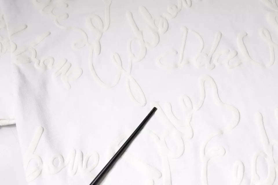 Handwritten design on fabric