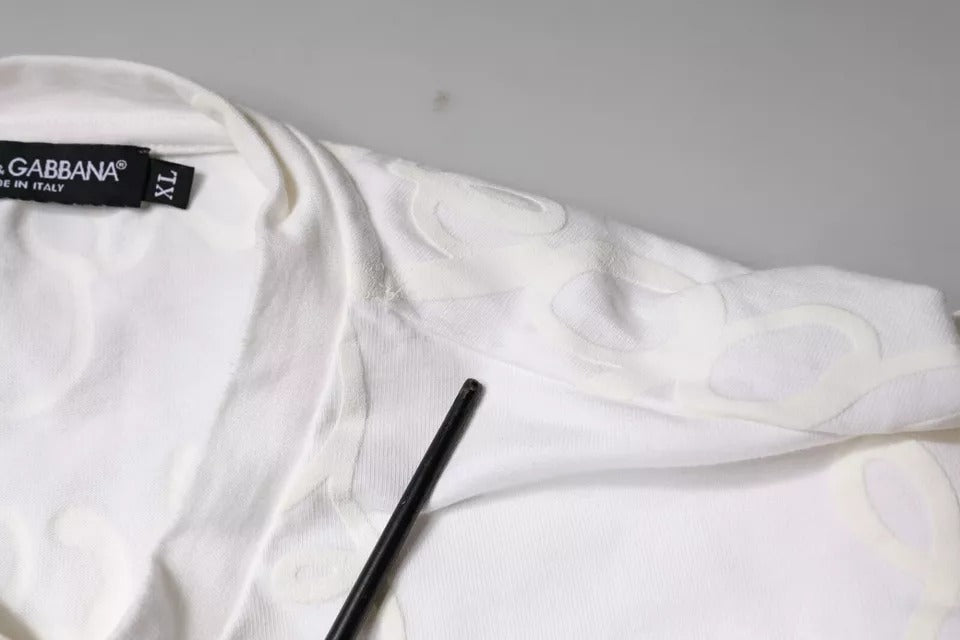 White baby onesie with black label