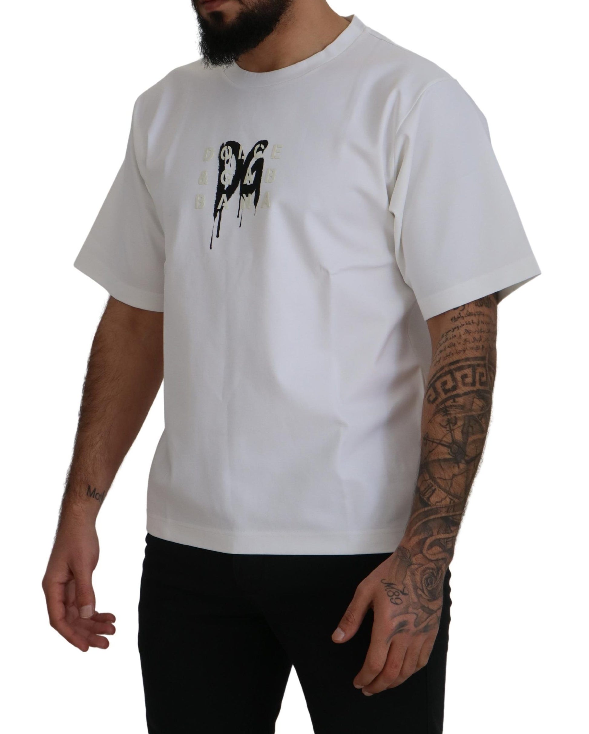 Man wearing white t-shirt with graphic design on front