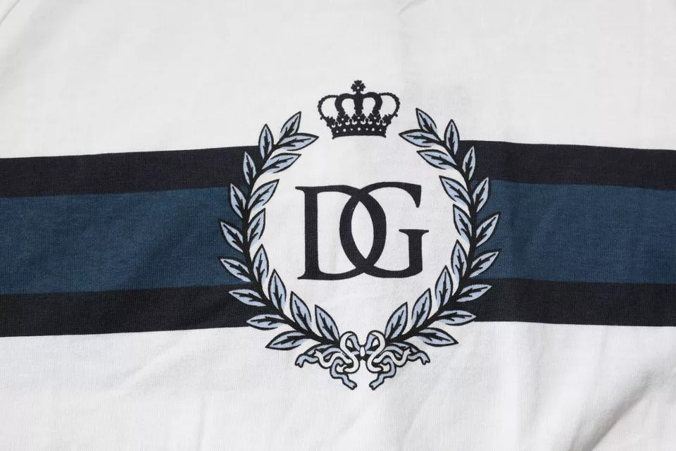 Blue and white striped fabric with embroidered crown and letters