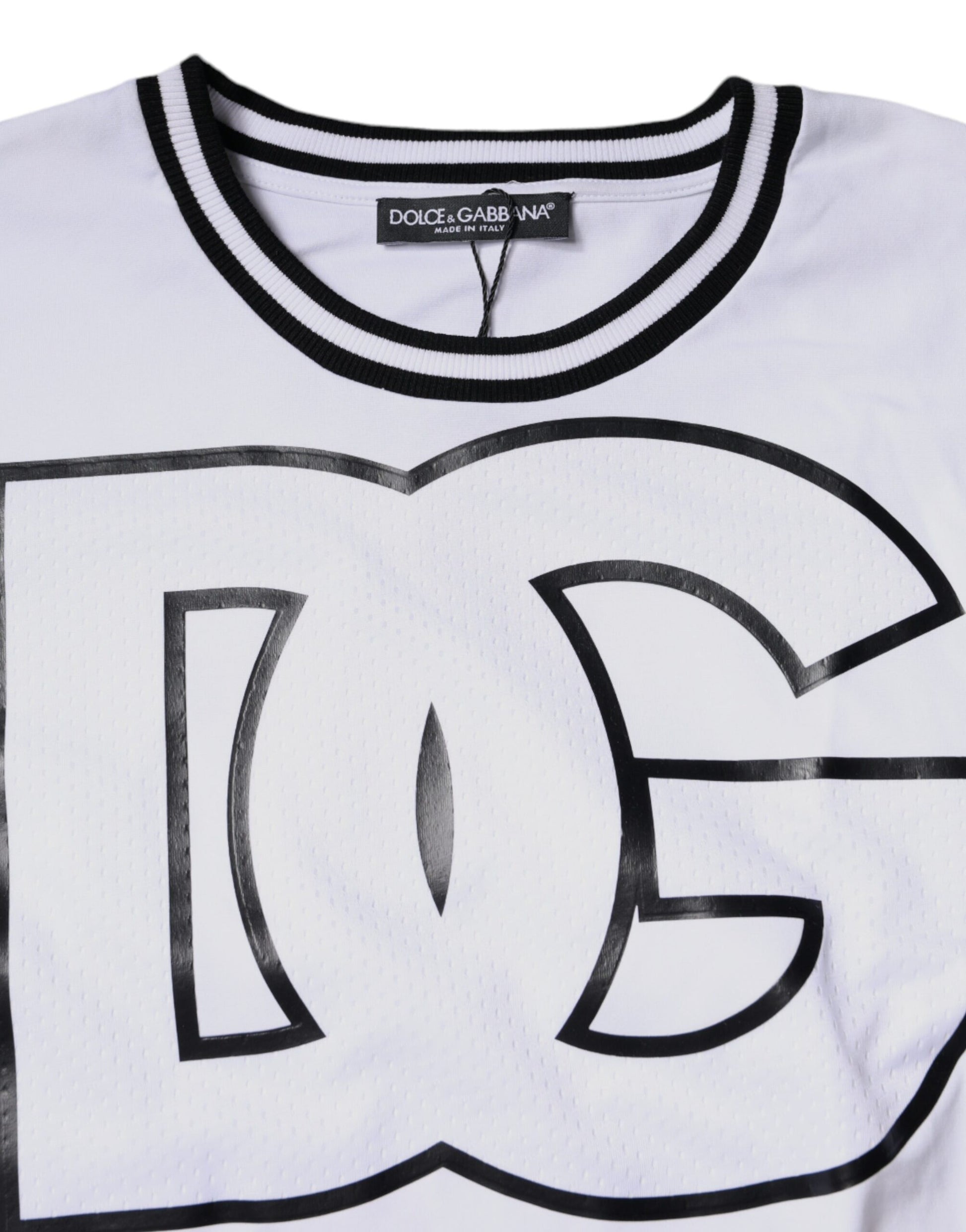 White t-shirt with black lettering featuring dc logo