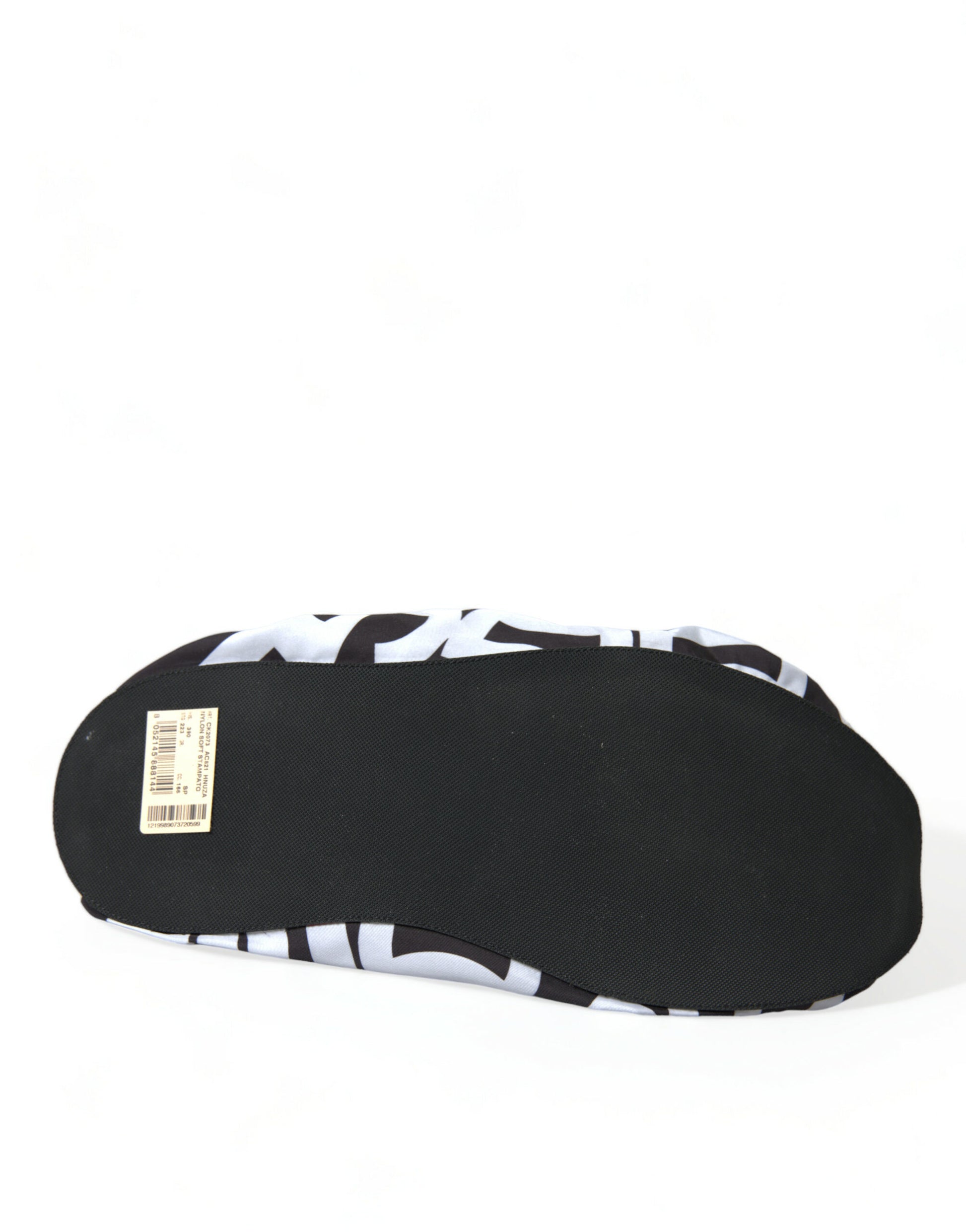 Black and white shoe insole with a label on it