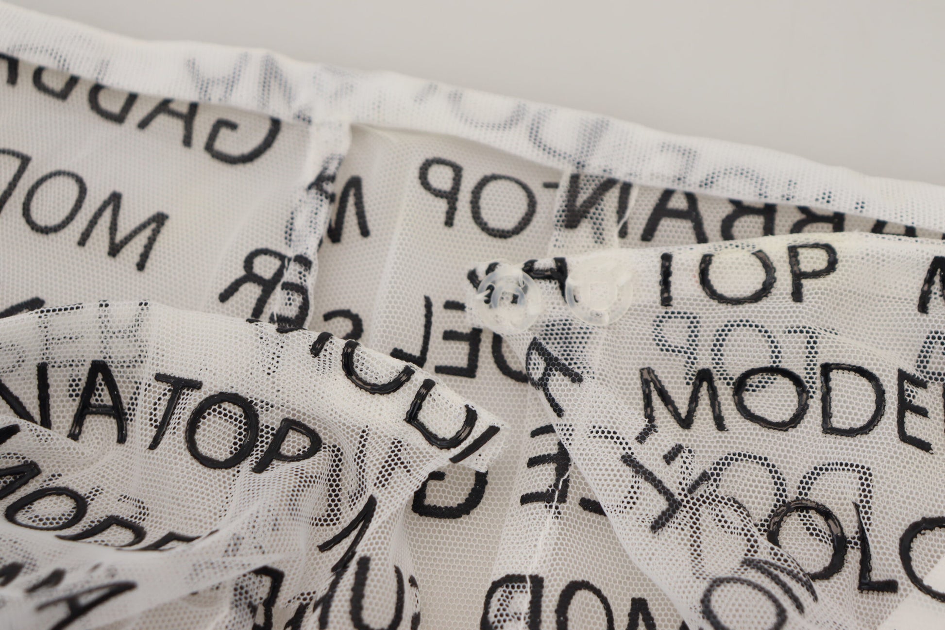 Text on a mesh fabric