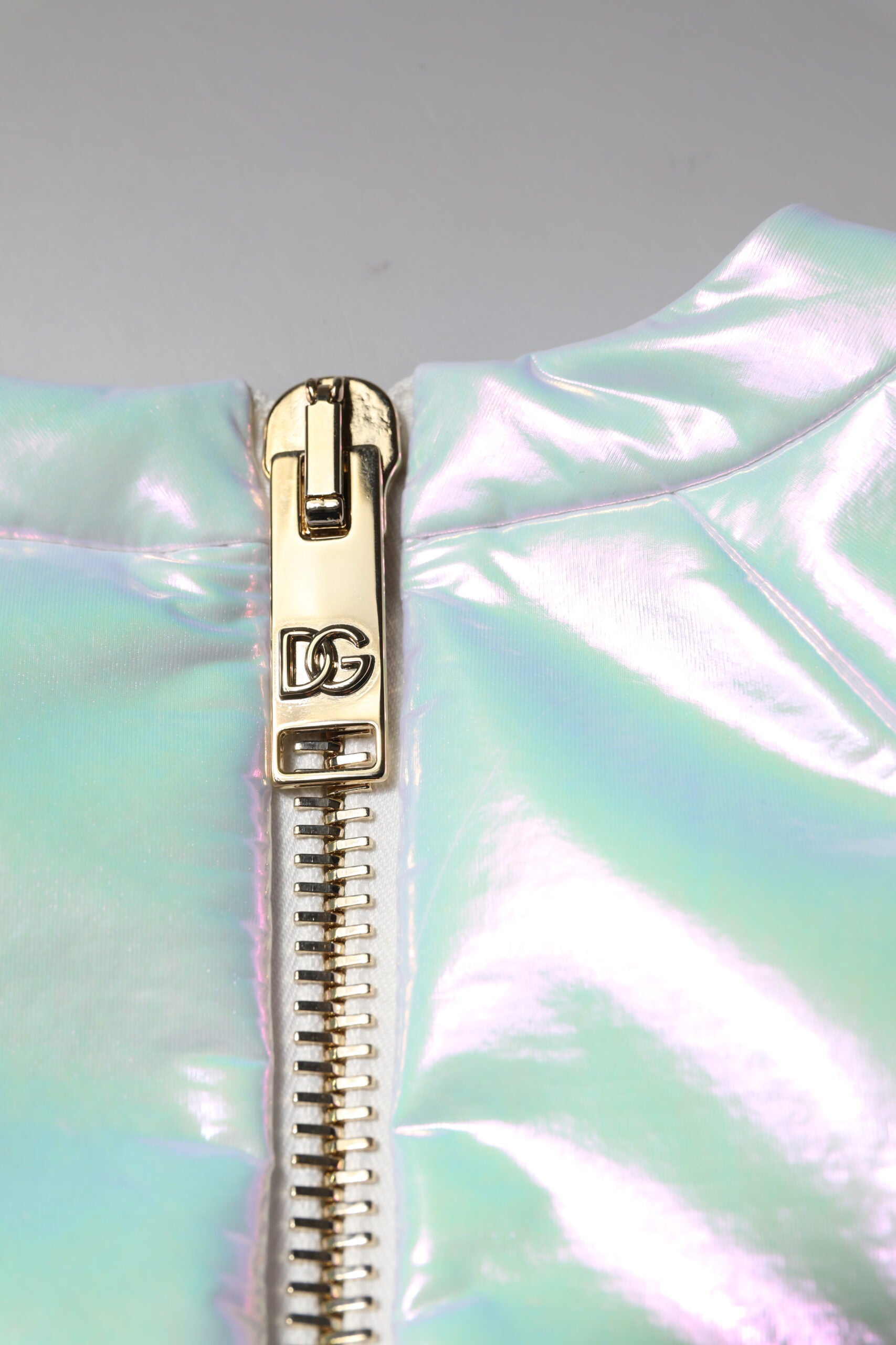 Gold zipper on white bodycon dress