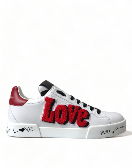 White sneaker with red and black accents featuring a Love graphic on side
