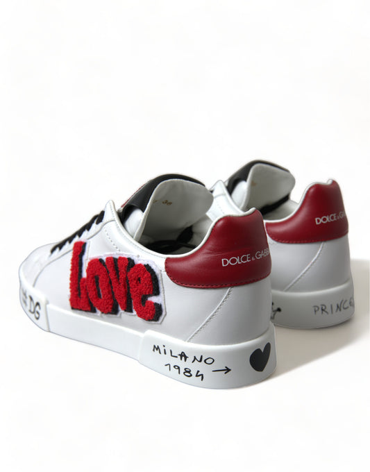 Pair of sneakers with red and white design on side