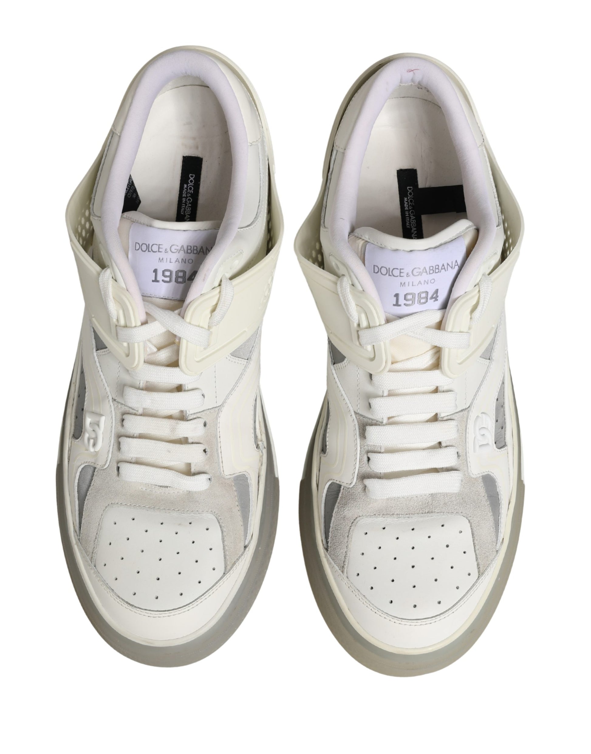 Pair of white sneakers with black laces and logo, featuring a low top design and custom 2.zero style