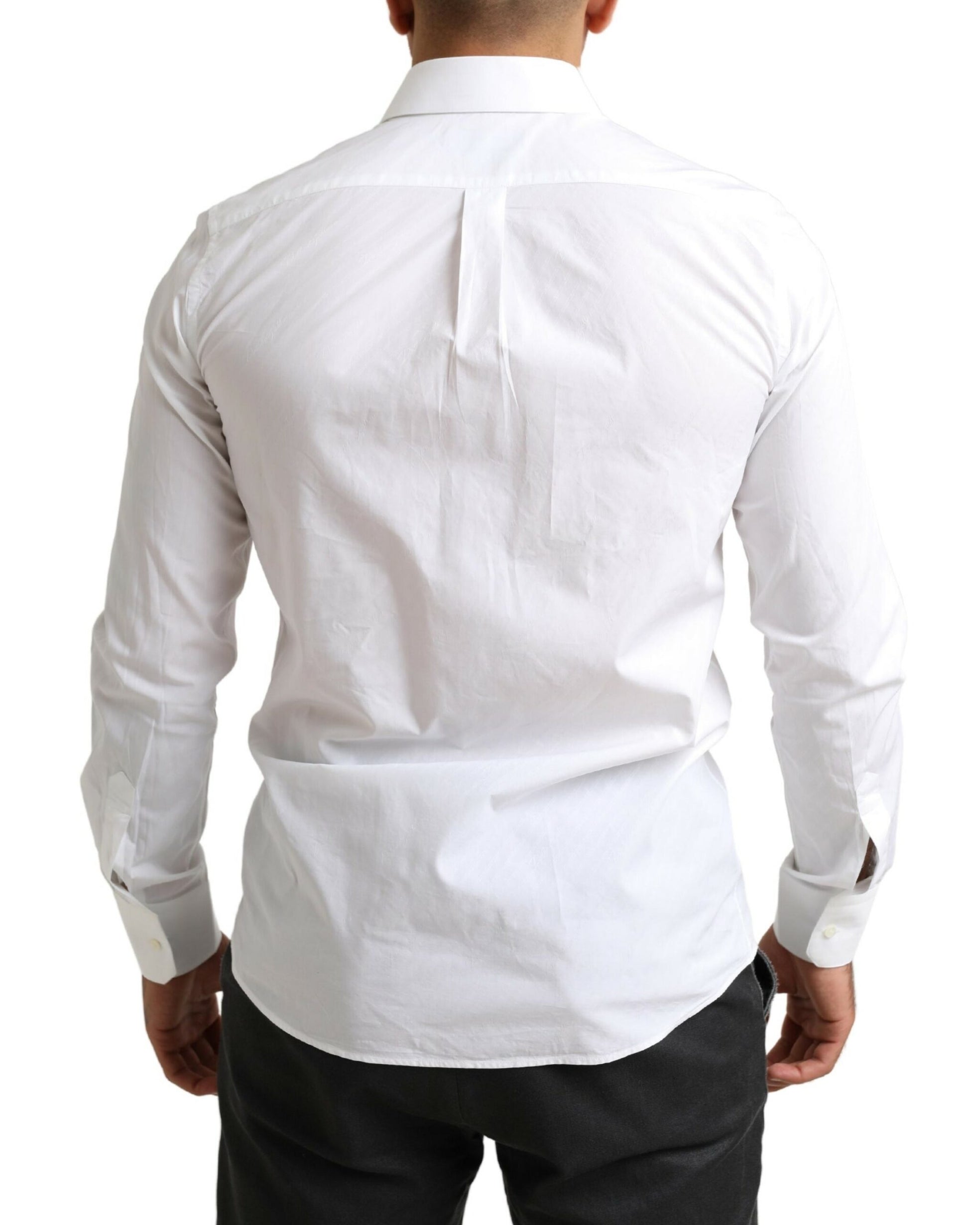 A white formal shirt with a collar, long sleeves and a button-up front