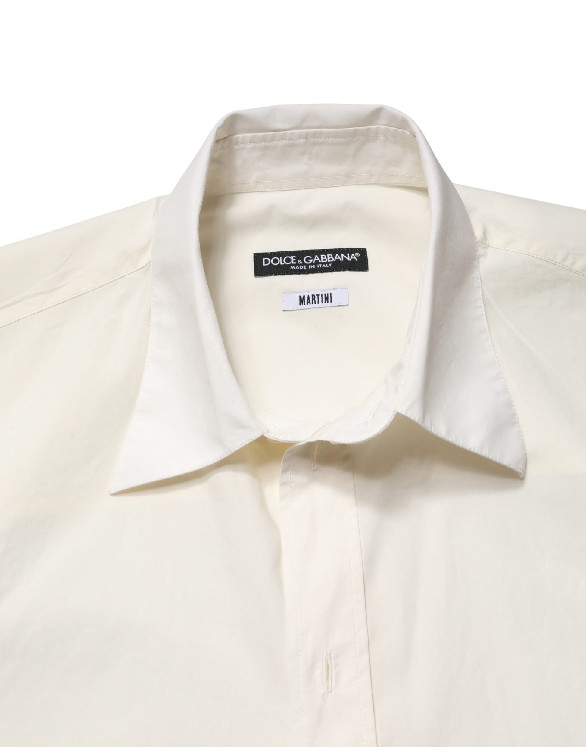 A white men's dress shirt with a collar and tag from Dolce & Gabbana