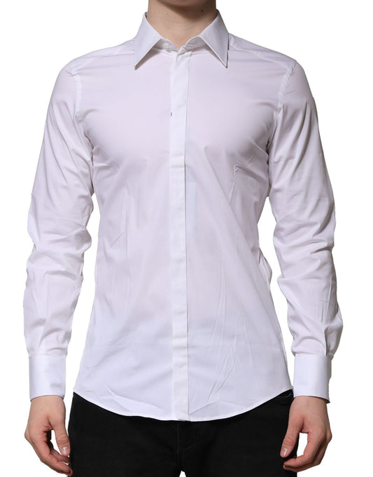 A long sleeve white shirt with a collar and button-up front