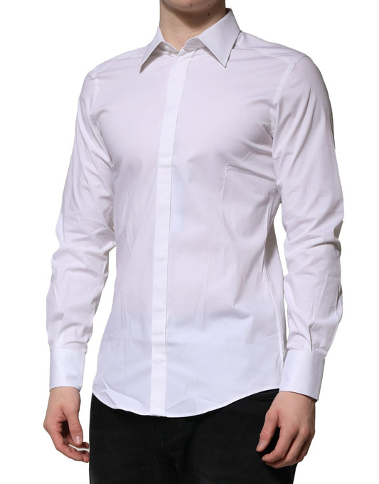 A mannequin wearing a white long-sleeved dress shirt