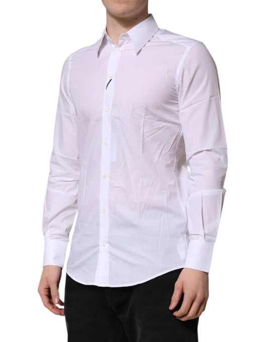 A long sleeve white shirt with a collar and button-up front