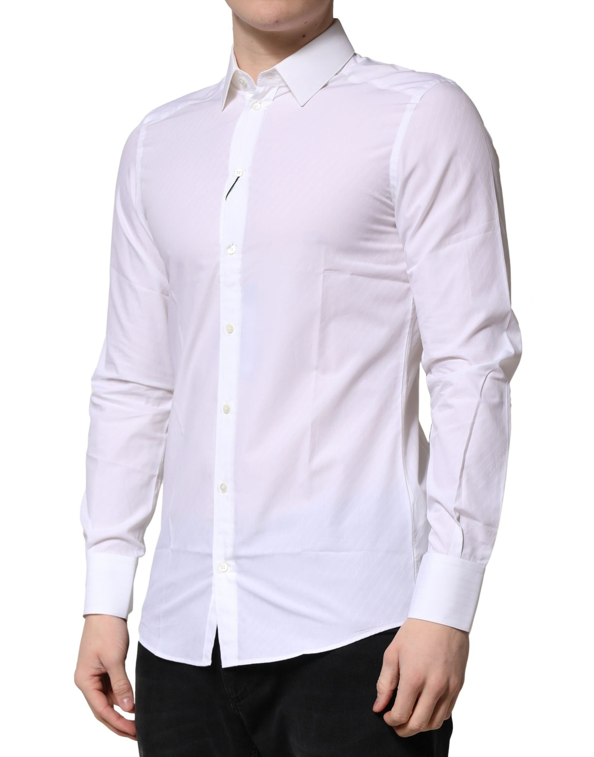 A long sleeve white shirt with a collar and button-down front
