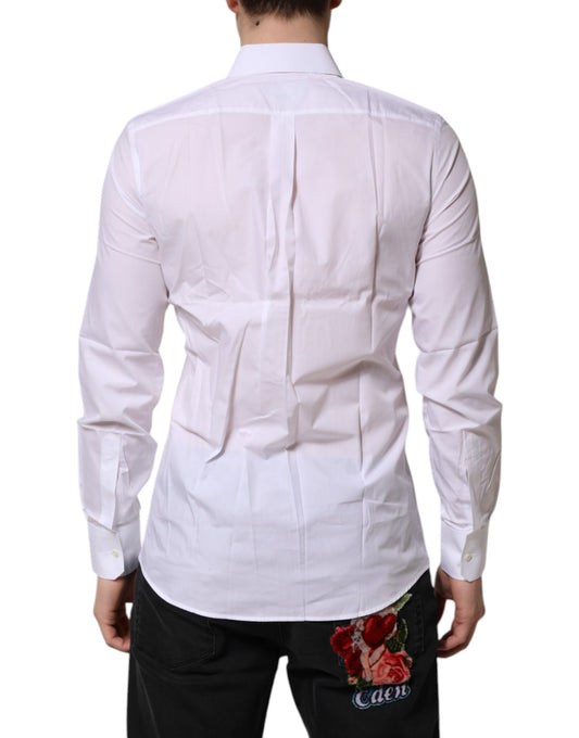 A long sleeve white dress shirt with a collar and button-up front