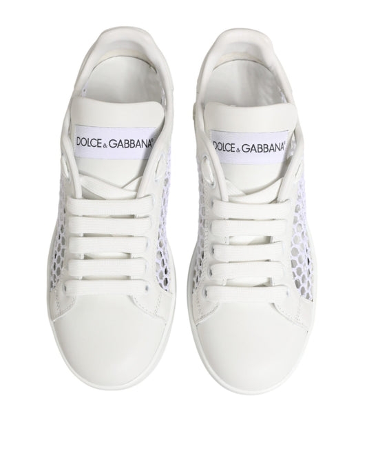 White sneakers with black laces and a logo on the side