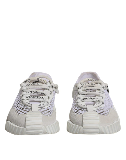 Pair of white mesh sneakers with laces and a low top design, featuring the brand name on the side