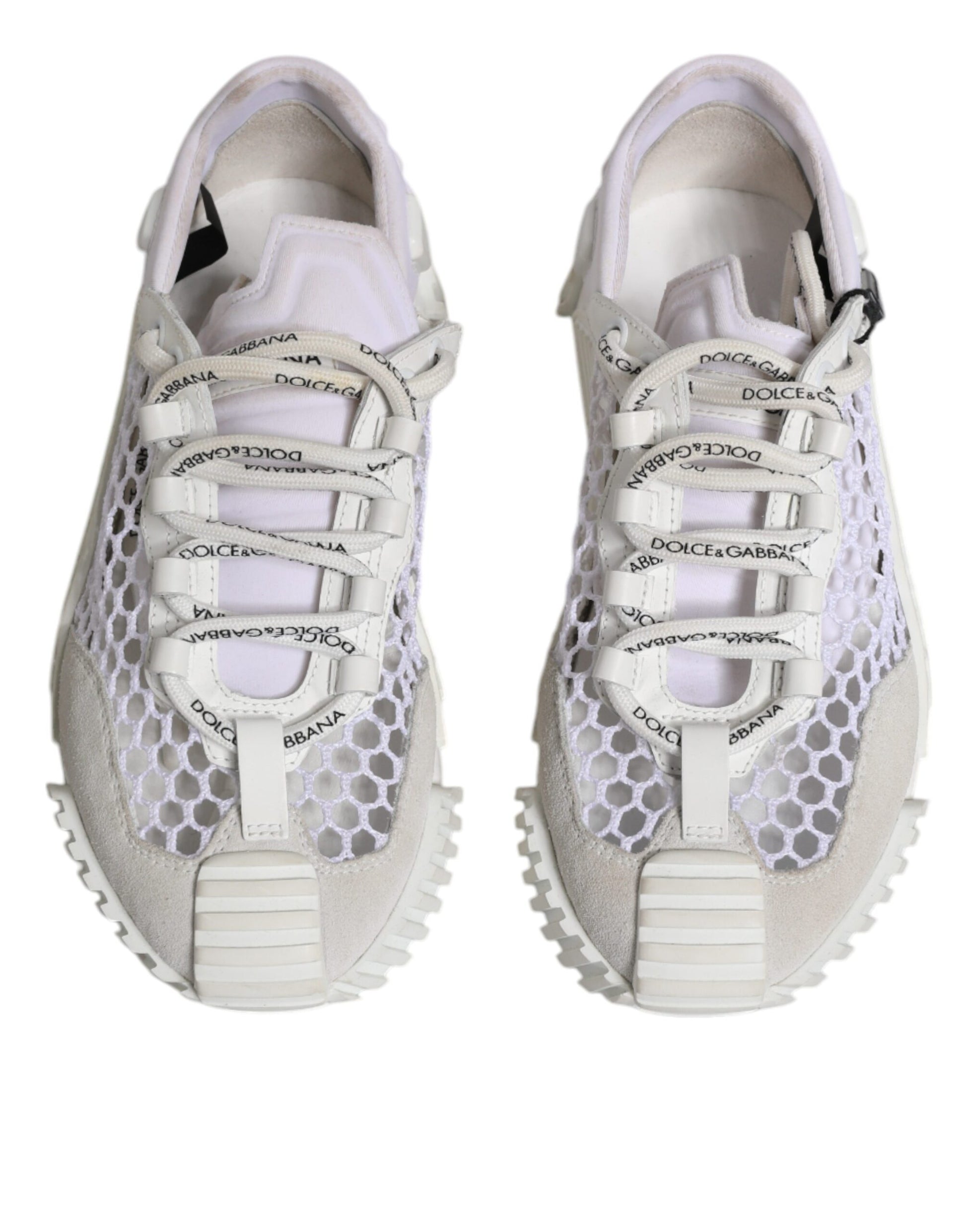 Pair of white mesh sports shoes with black laces and logo, featuring a low top design