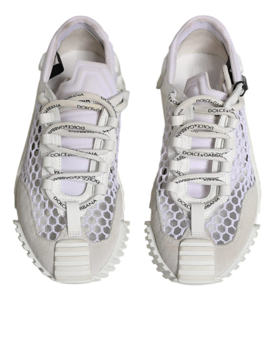 Pair of white mesh sports shoes with black laces and logo, featuring a low top design