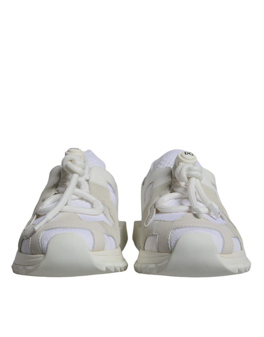 Pair of white mesh sneakers with laces and logo on side, from Dolce & Gabbana