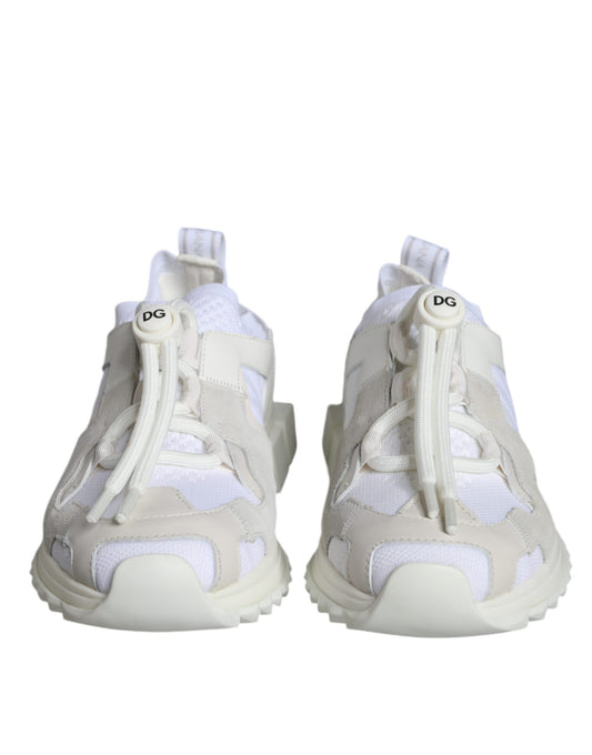 Pair of baby shoes with laces and a logo on the side