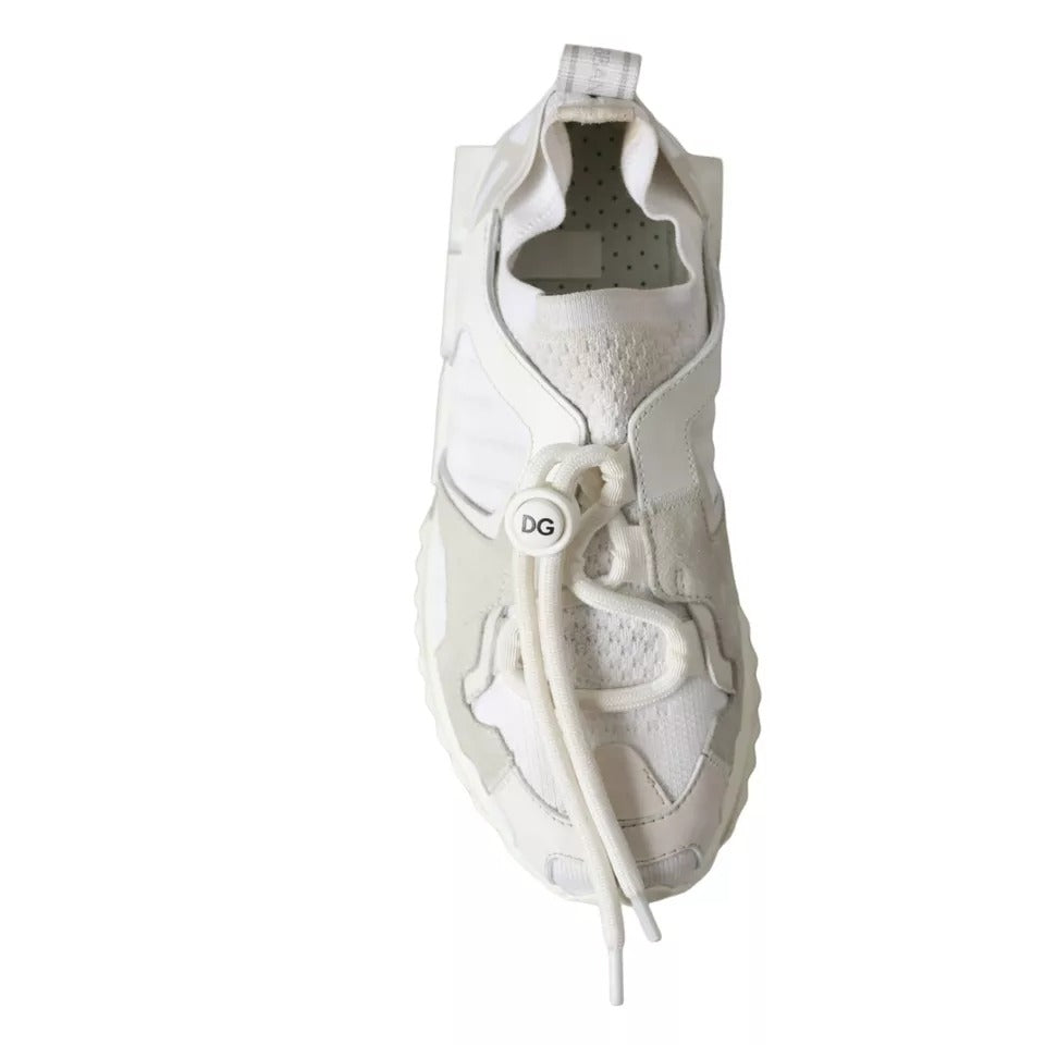 A pair of white mesh sneakers with a lace-up front and a pull tab on the back