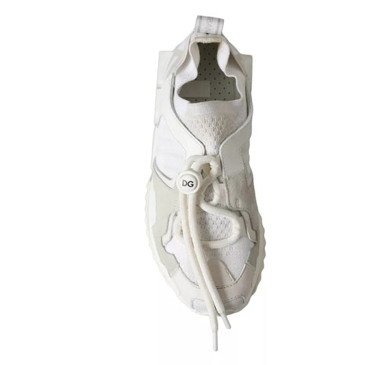 A pair of white mesh sneakers with a lace-up front and a pull tab on the back