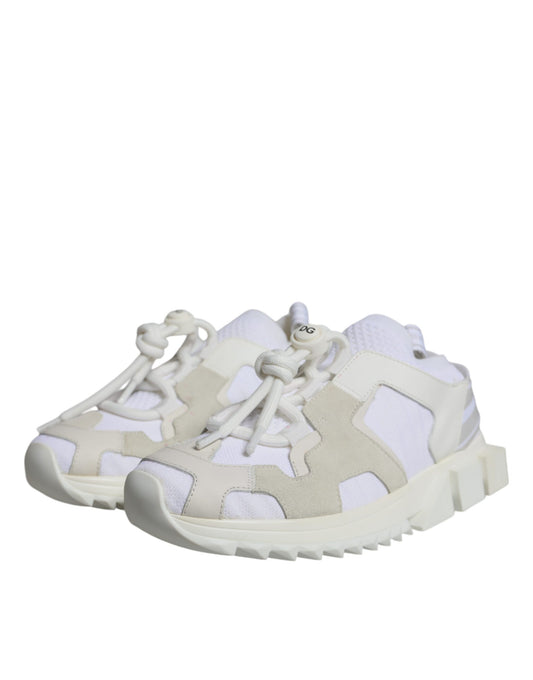 Pair of white mesh sneakers with laces and a logo on the side