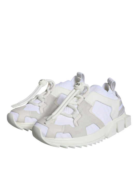 Pair of baby shoes with laces and a camouflage pattern