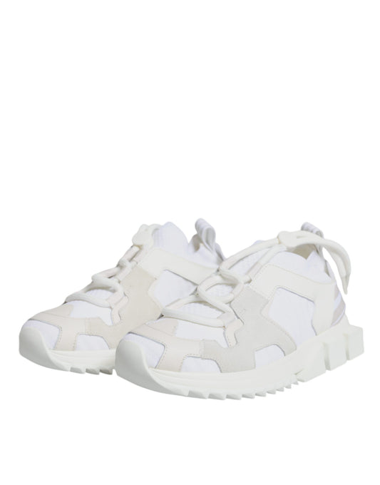 A pair of white mesh sneakers with a camouflage pattern, featuring laces and a low-top design