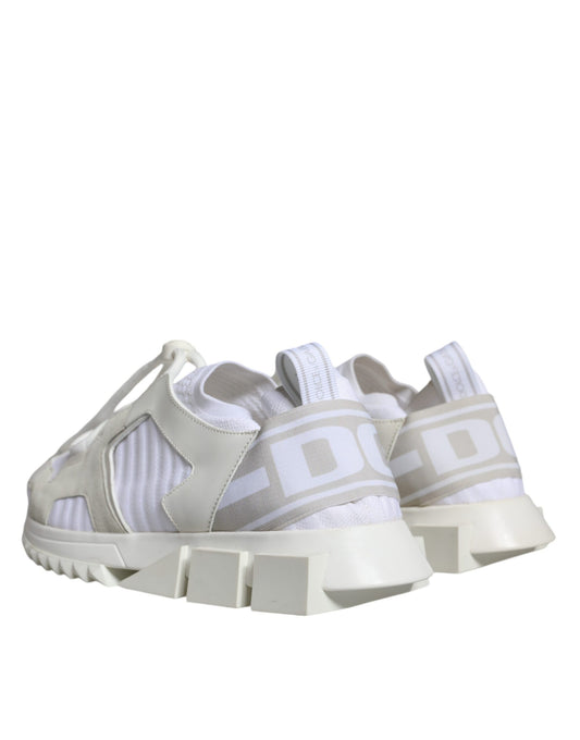 Pair of white mesh sneakers with black laces and logo on side