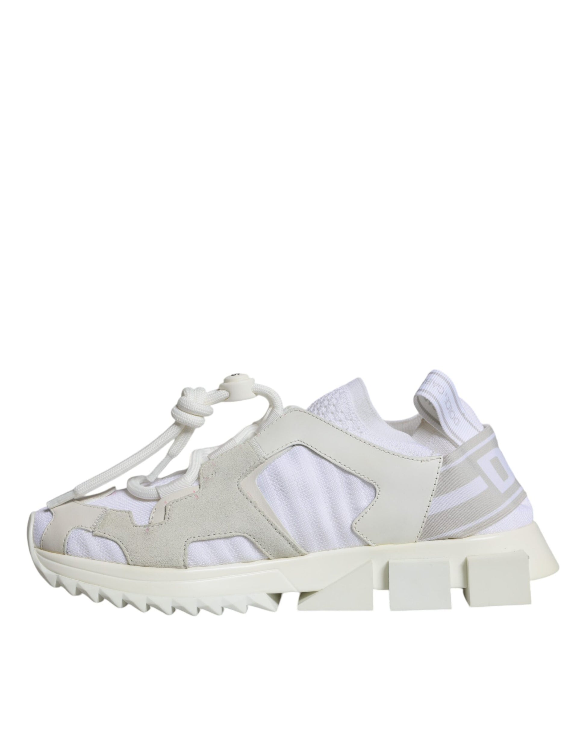 A pair of white mesh sneakers with a chunky sole, featuring the brand name "Dolce & Gabbana" on the side