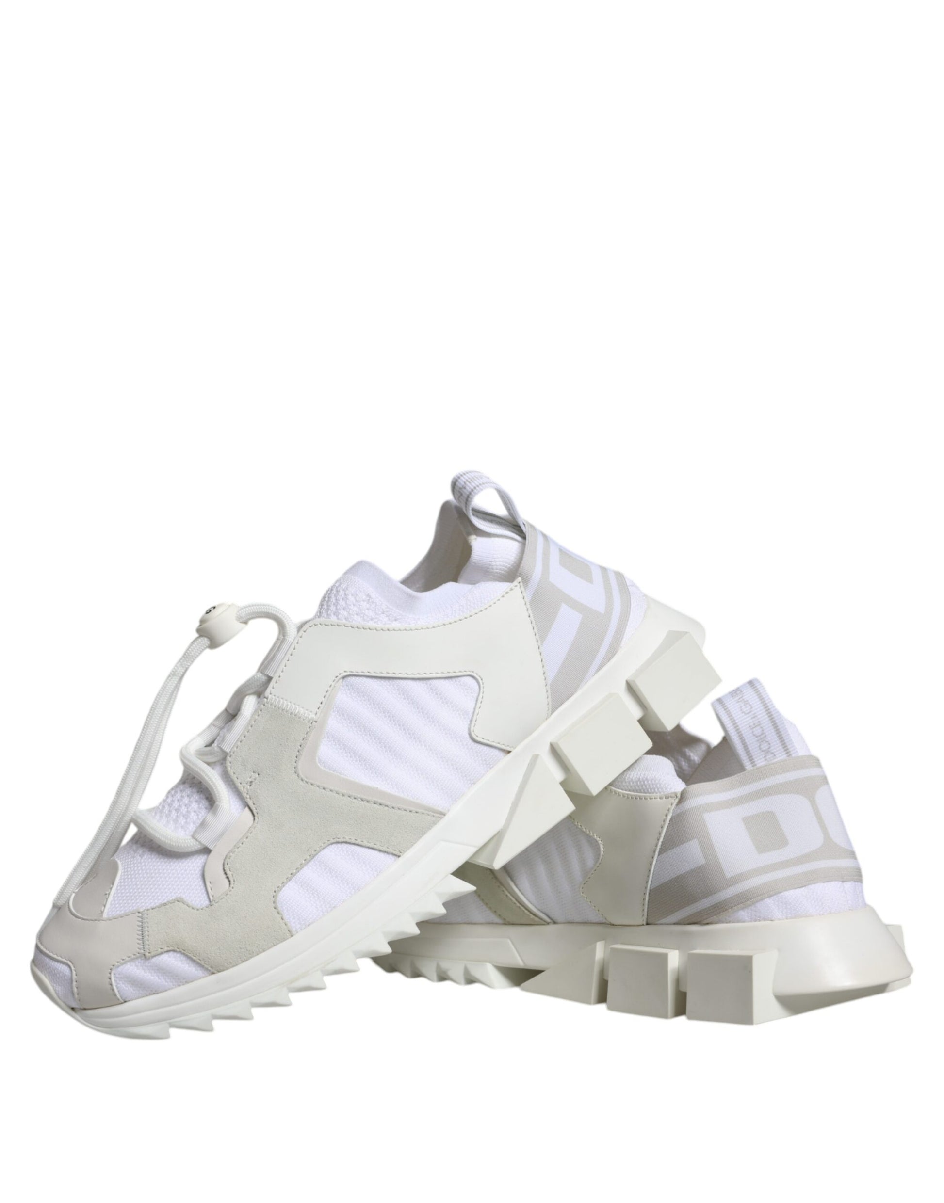 Pair of white mesh sneakers with laces and a patterned sole, designed by Dolce & Gabbana