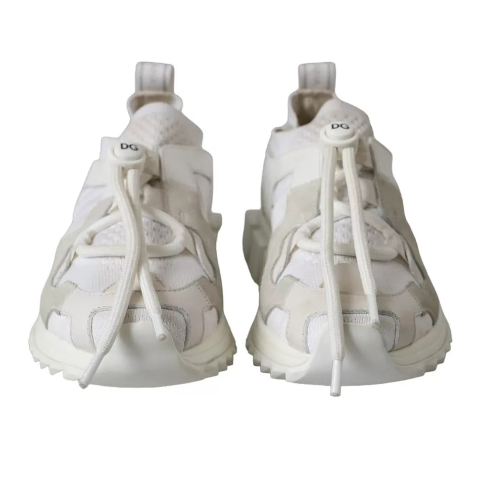 Pair of white mesh sneakers with laces and logo on side, from Dolce & Gabbana