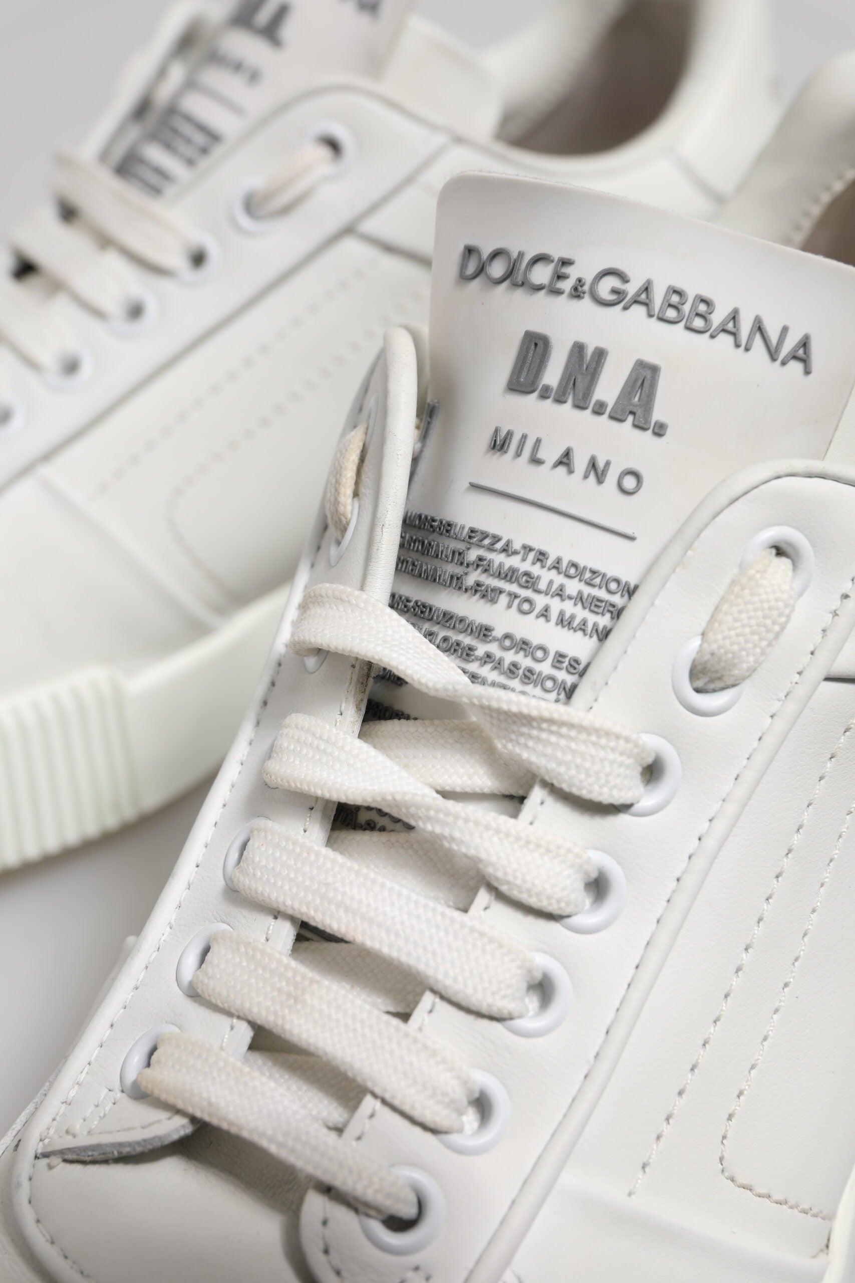White sneakers with tan laces