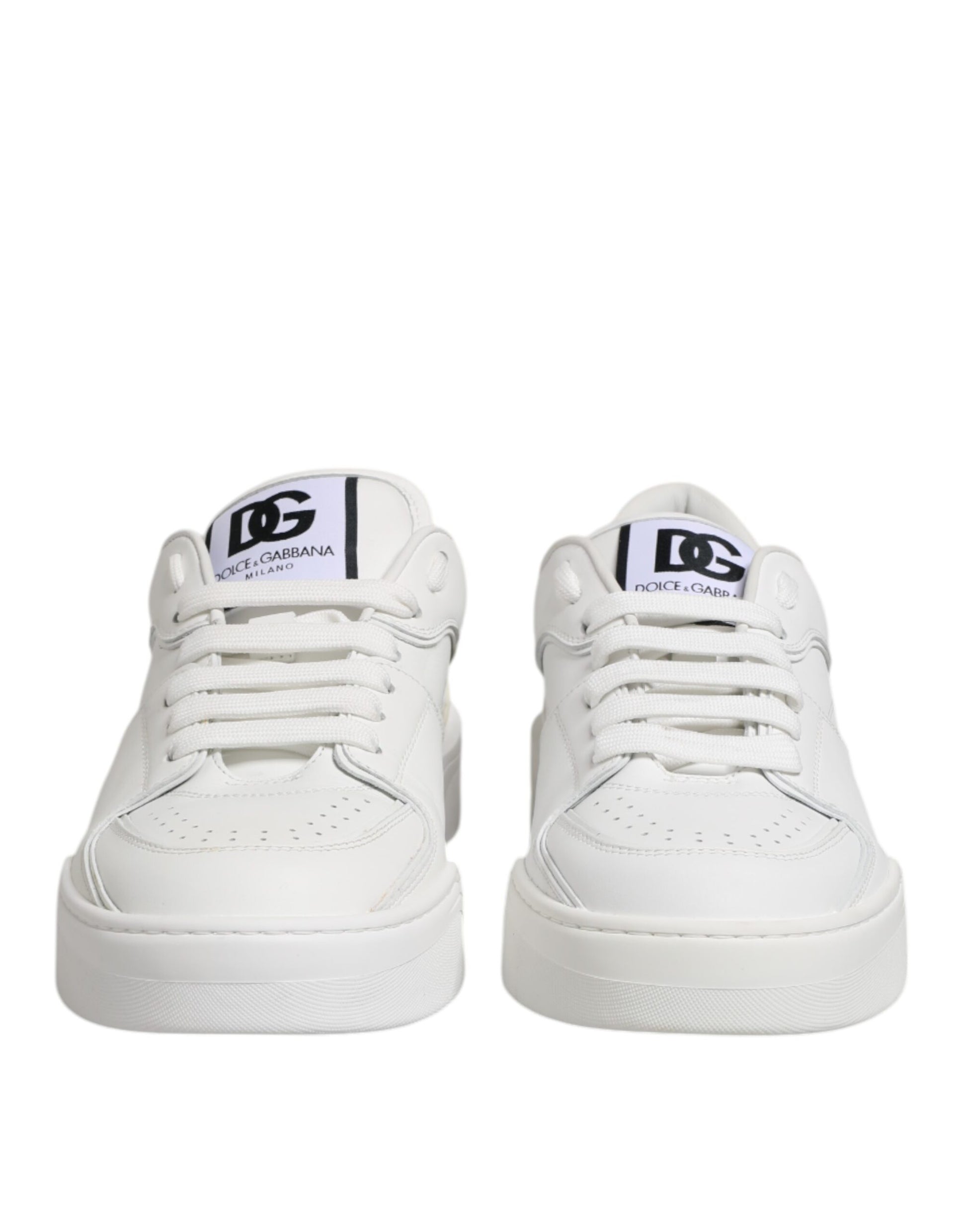 Pair of white leather sneakers with black laces and logo, featuring low top design