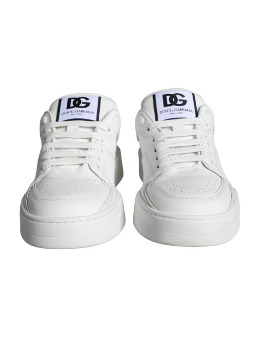 White leather sneakers with black laces, branded logo on tongue and side