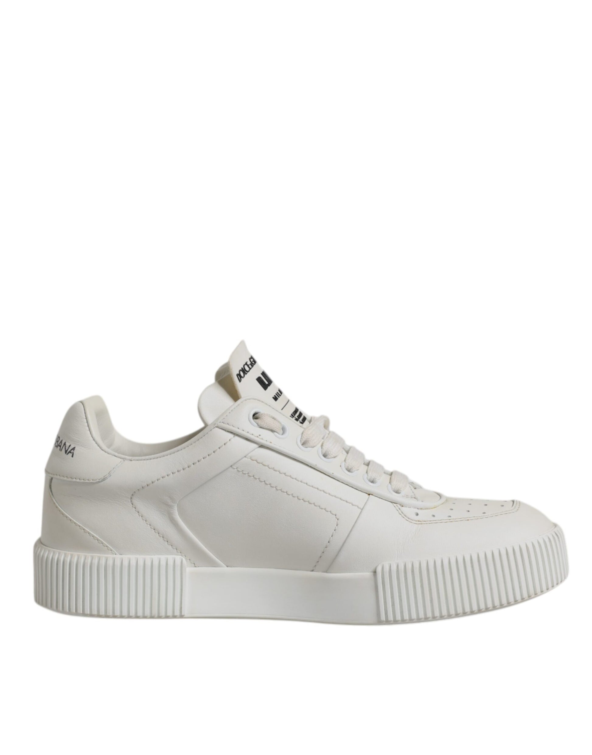 A pair of white leather sneakers with a low top, featuring a chunky sole and a logo on the side