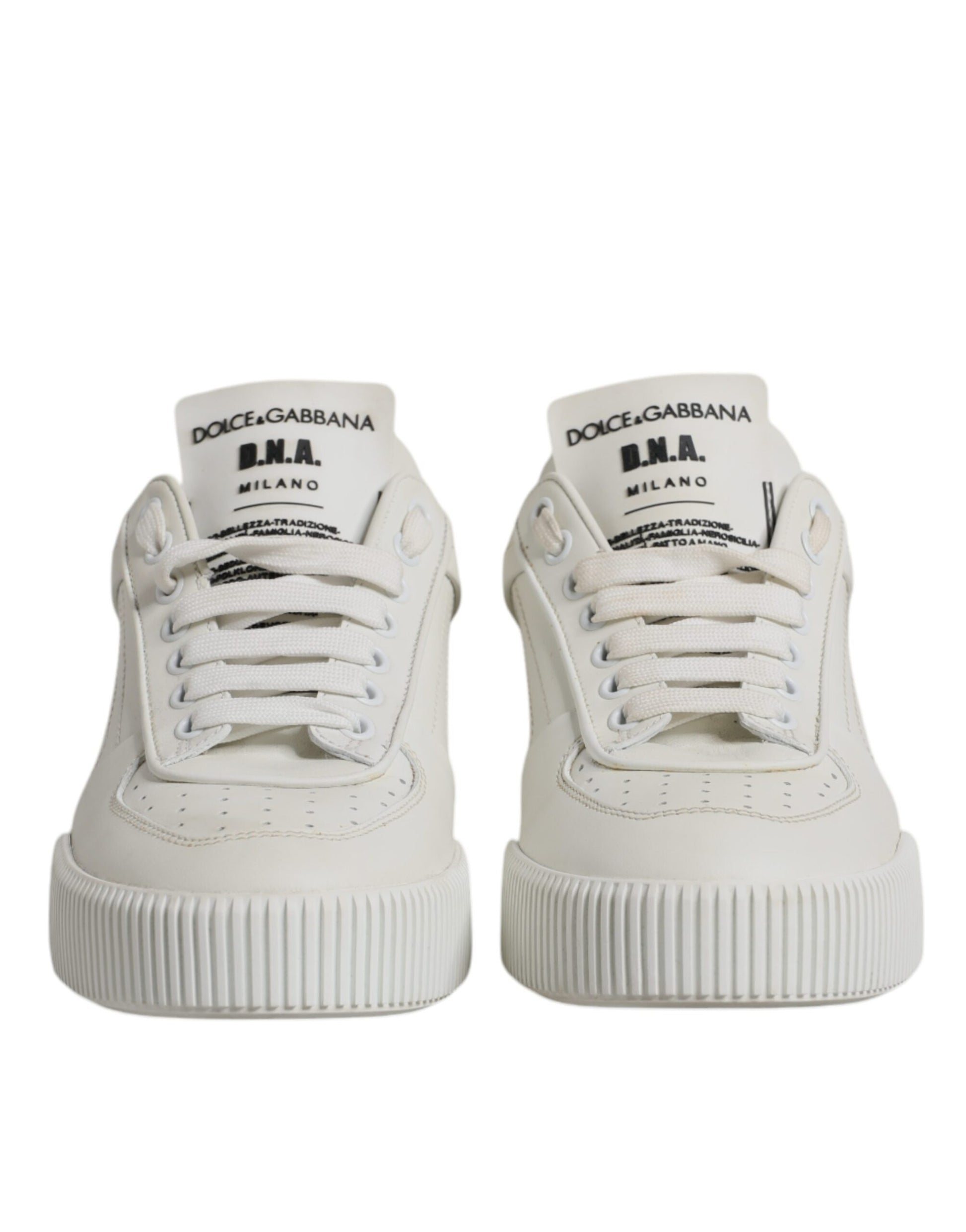 Pair of white leather sneakers with black laces and logo on side, from Dolce & Gabbana
