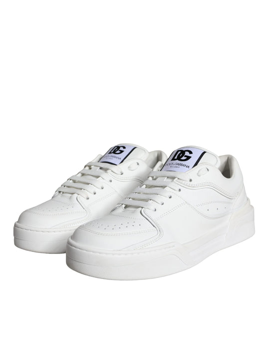 White leather low top sneakers with black laces and logo on side