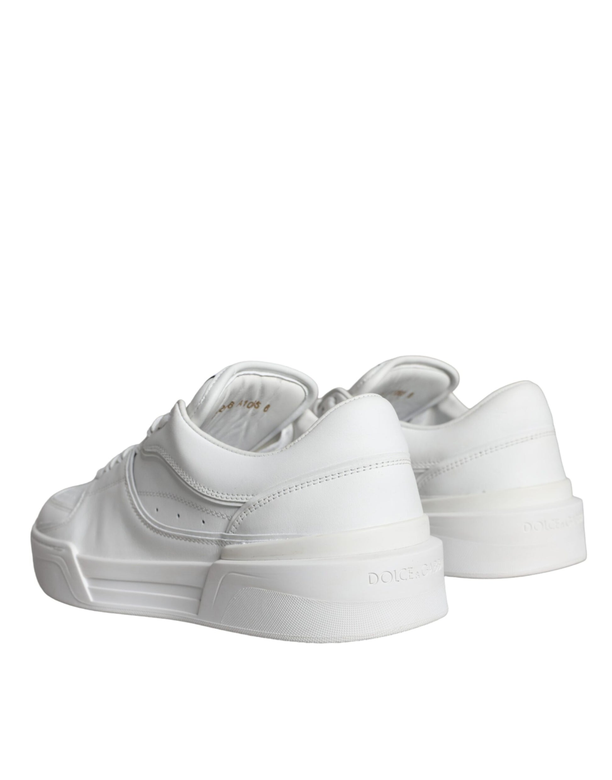 Pair of white leather sneakers with low top, featuring a logo on the side and a lace-up front