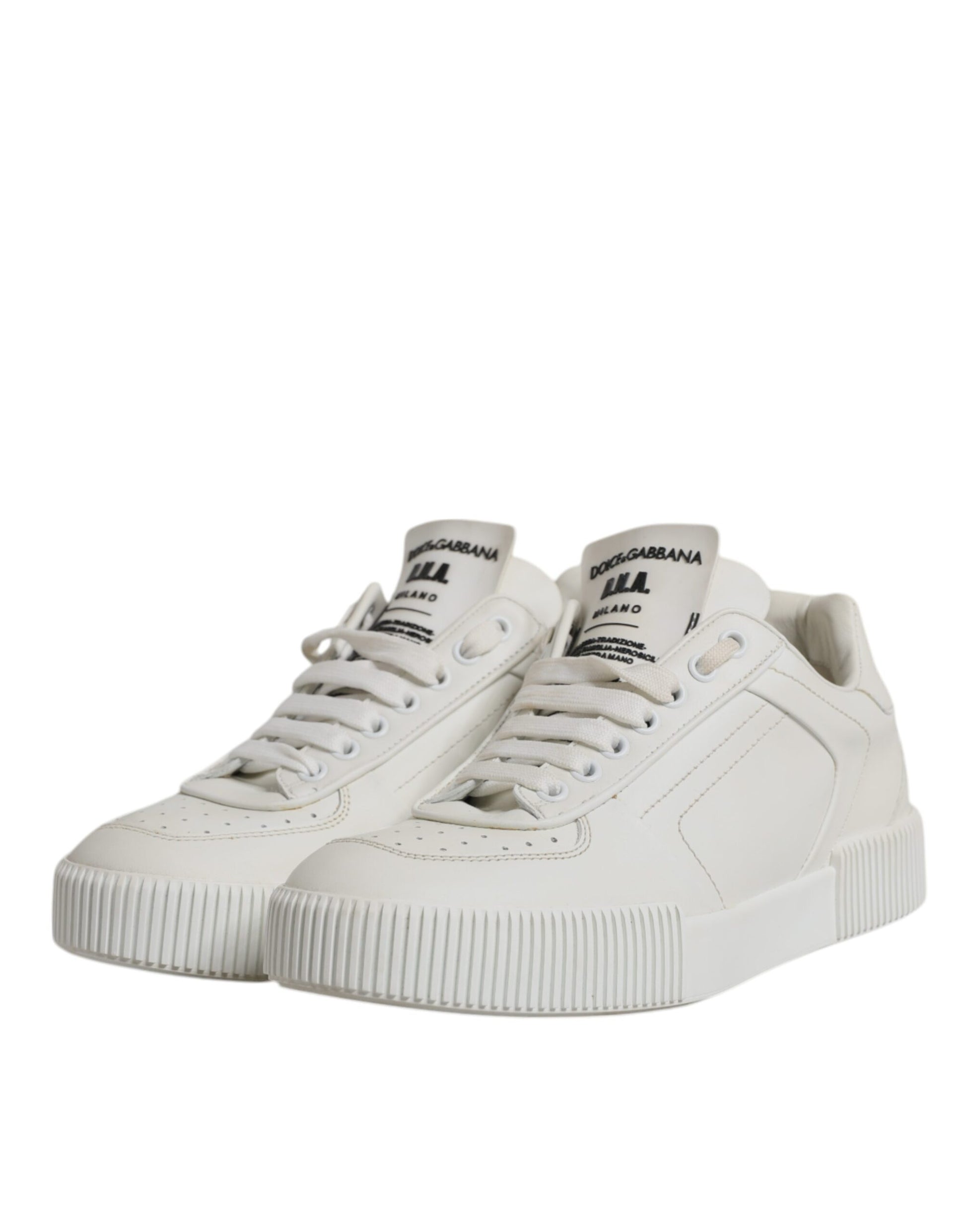 White leather low top sneakers with silver laces and logo on side