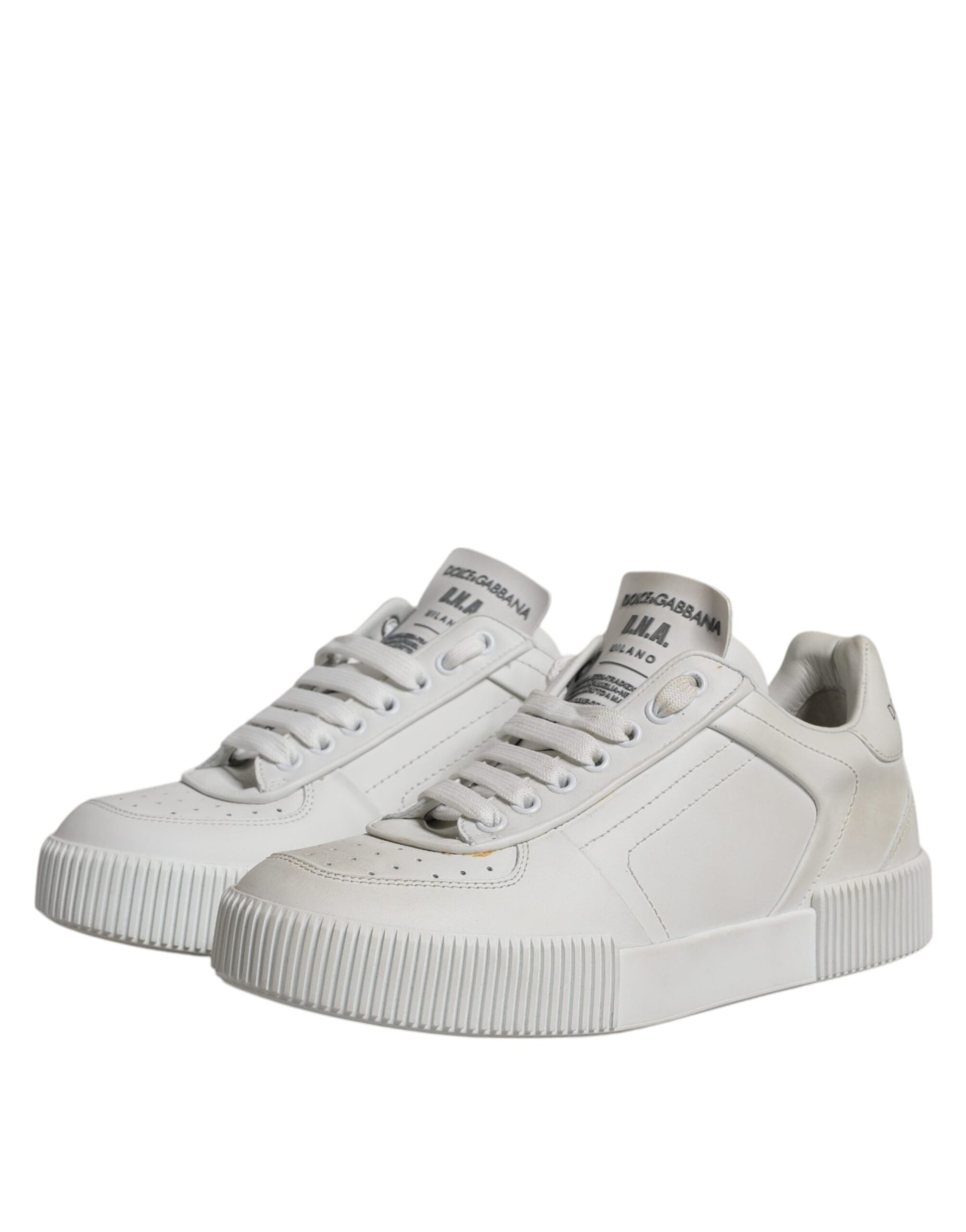 White leather low top sneakers with embossed logo and perforated details