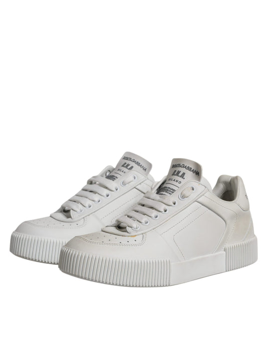 White leather low top sneakers with embossed logo and perforated details