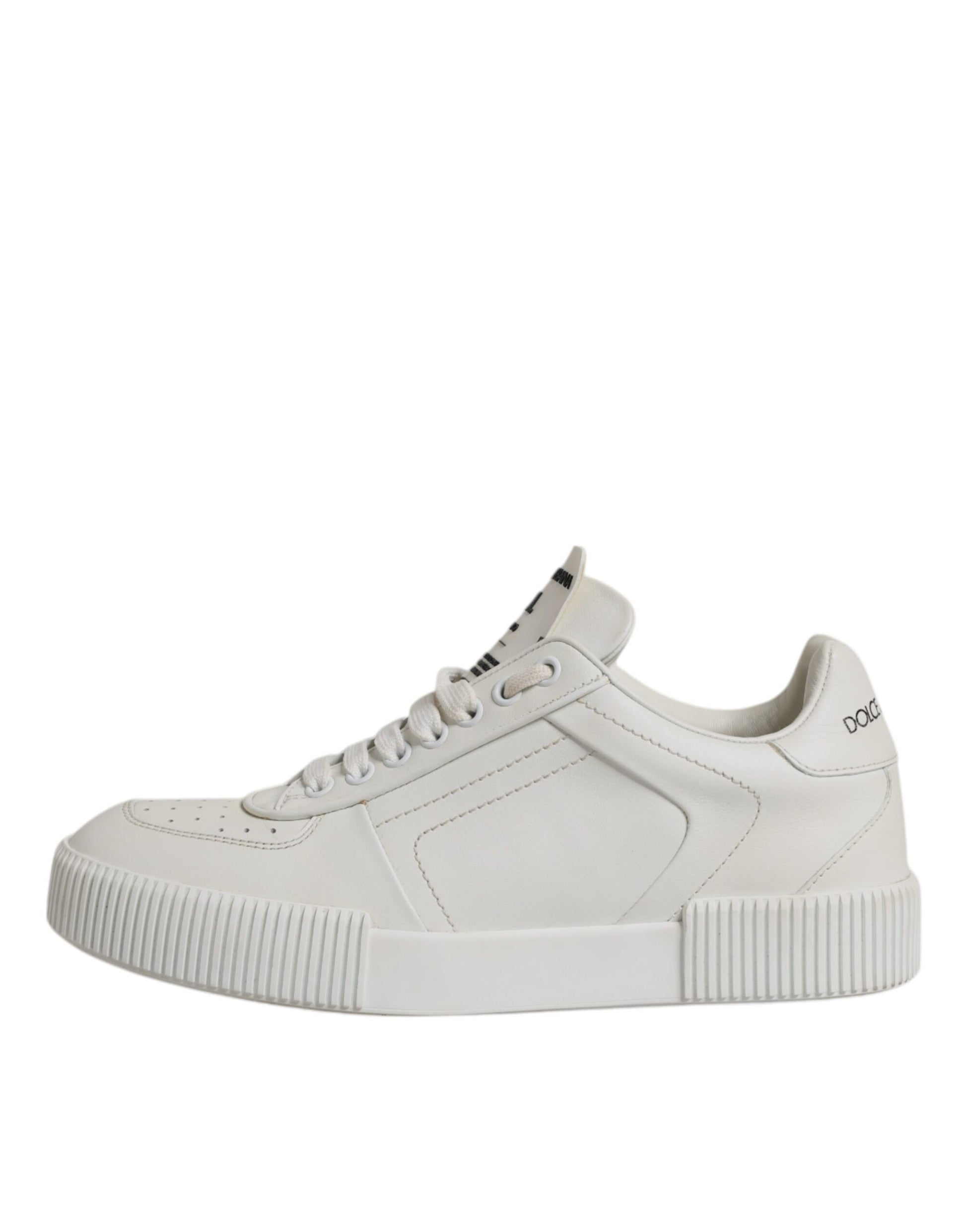 A pair of white leather sneakers with a low top, featuring a chunky sole and a lace-up front