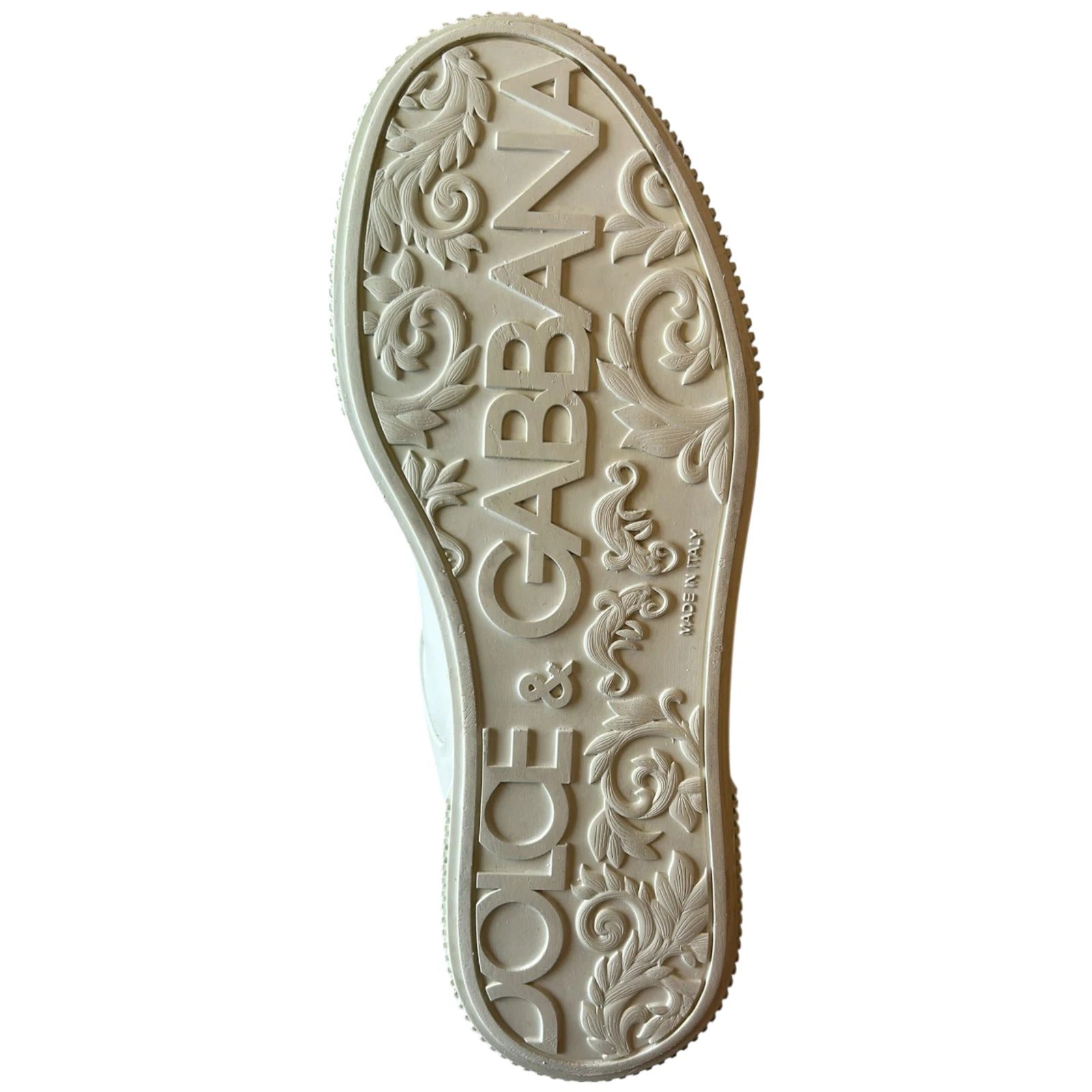 Footwear with brand name embossed on sole